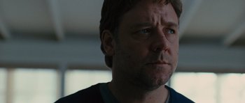 Movie still from “The Next Three Days” (2010), directed by Paul Haggis – A person looking at the camera; Close Up shot, Low angle