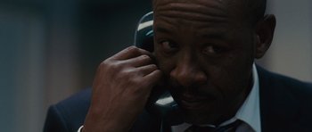 Movie still from “The Next Three Days” (2010), directed by Paul Haggis – A person talking on a phone; Close Up shot, Low angle