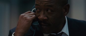 Movie still from “The Next Three Days” (2010), directed by Paul Haggis – A person talking on a phone; Close Up shot, Low angle