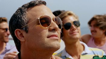 Movie still from “The Normal Heart” (2014), directed by Ryan Murphy – Two men wearing sunglasses and one is wearing a yellow shirt; Close Up shot, Low angle