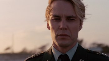 Movie still from “The Normal Heart” (2014), directed by Ryan Murphy – A person wearing a military uniform; Close Up shot, Low angle