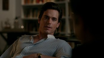 Movie still from “The Normal Heart” (2014), directed by Ryan Murphy – A person sitting in a room; Close Up shot, Over the shoulder angle