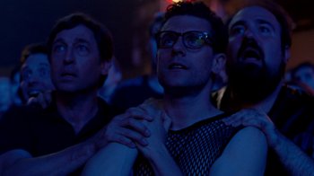 Movie still from “The Normal Heart” (2014), directed by Ryan Murphy – A man with his hands clasped in front of his face; Medium shot, Low angle