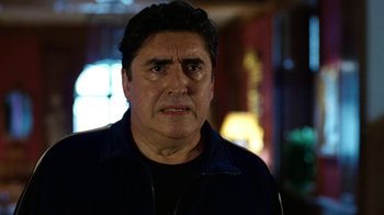 Movie still from “The Normal Heart” (2014), directed by Ryan Murphy – A person wearing a jacket; Close Up shot, Over the shoulder angle