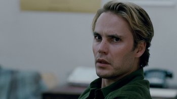 Movie still from “The Normal Heart” (2014), directed by Ryan Murphy – A person with long blonde hair; Close Up shot, Over the shoulder angle