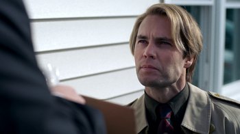 Movie still from “The Normal Heart” (2014), directed by Ryan Murphy – A person wearing a suit and a tie; Close Up shot, Over the shoulder angle