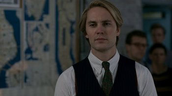 Movie still from “The Normal Heart” (2014), directed by Ryan Murphy – A man with blonde hair wearing a vest and a tie; Close Up shot, Over the shoulder angle