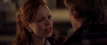 Movie still from “The Notebook” (2004), directed by Nick Cassavetes – A young woman is crying while talking to a young man; Close Up shot, Over the shoulder angle