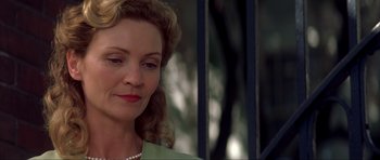 Movie still from “The Notebook” (2004), directed by Nick Cassavetes – A person wearing a necklace; Close Up shot, Low angle