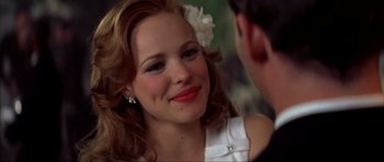 Movie still from “The Notebook” (2004), directed by Nick Cassavetes – A person with a flower in her hair; Close Up shot, Over the shoulder angle