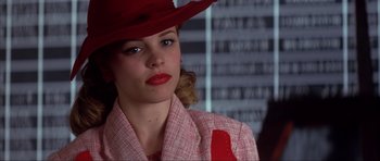 Movie still from “The Notebook” (2004), directed by Nick Cassavetes – A woman wearing a red hat and red lipstick; Close Up shot, Over the shoulder angle
