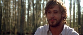 Movie still from “The Notebook” (2004), directed by Nick Cassavetes – A person with a beard; Close Up shot, Over the shoulder angle