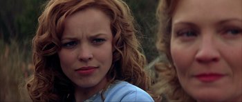 Movie still from “The Notebook” (2004), directed by Nick Cassavetes – A person with curly hair; Close Up shot, Over the shoulder angle