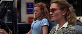 Movie still from “The Notebook” (2004), directed by Nick Cassavetes – A woman and a girl sitting next to each other on a bus; Close Up shot, Over the shoulder angle