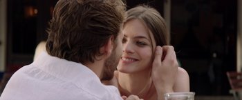 Movie still from “The November Man” (2014), directed by Roger Donaldson – A man and a woman looking into each others eyes; Close Up shot, Over the shoulder angle