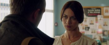 Movie still from “The November Man” (2014), directed by Roger Donaldson – A man and a woman looking at one another; Close Up shot, Over the shoulder angle