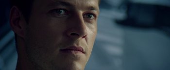 Movie still from “The November Man” (2014), directed by Roger Donaldson – A man's face in a dark room; Extreme Close Up shot, Low angle