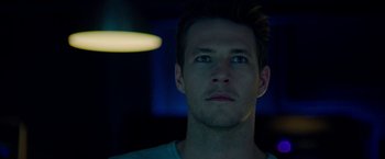 Movie still from “The November Man” (2014), directed by Roger Donaldson – A person looking up at the sky; Close Up shot, Low angle
