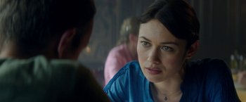 Movie still from “The November Man” (2014), directed by Roger Donaldson – A person sitting in front of another person; Close Up shot, Over the shoulder angle