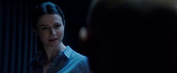 Movie still from “The November Man” (2014), directed by Roger Donaldson – A person wearing a blue shirt; Close Up shot, Over the shoulder angle