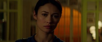 Movie still from “The November Man” (2014), directed by Roger Donaldson – A person wearing a blue shirt; Close Up shot, Over the shoulder angle