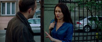 Movie still from “The November Man” (2014), directed by Roger Donaldson – A man and a woman talking on the street; Medium shot, Over the shoulder angle