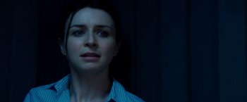 Movie still from “The November Man” (2014), directed by Roger Donaldson – A person looking at the camera; Close Up shot, Over the shoulder angle