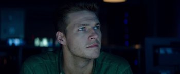 Movie still from “The November Man” (2014), directed by Roger Donaldson – A person with a green shirt; Close Up shot, Low angle