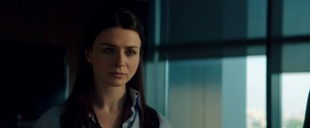 Movie still from “The November Man” (2014), directed by Roger Donaldson – A person with long hair; Close Up shot, Over the shoulder angle