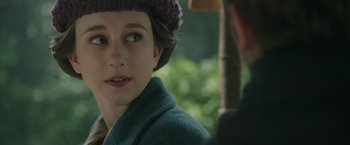 Movie still from “The Nun” (2018), directed by Corin Hardy – A person wearing a hat; Close Up shot, Over the shoulder angle