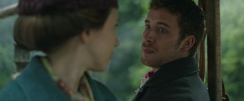 Movie still from “The Nun” (2018), directed by Corin Hardy – A man and a woman looking at one another; Close Up shot, Over the shoulder angle