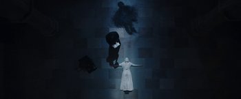 Movie still from “The Nun” (2018), directed by Corin Hardy – A person in a white robe and a person in a black robe; Wide shot, Overhead angle