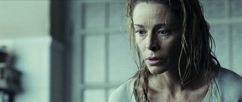 Movie still from “The Orphanage” (2007), directed by J.A. Bayona – A person with wet hair; Close Up shot, Low angle