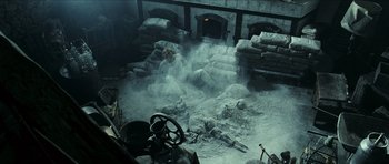 Movie still from “The Orphanage” (2007), directed by J.A. Bayona – An image of an old car in the middle of the snow; Wide shot, High angle