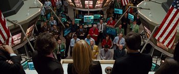 Movie still from “The Other Guys” (2010), directed by Adam McKay – A group of people sitting in a room with computer monitors; Wide shot, High angle