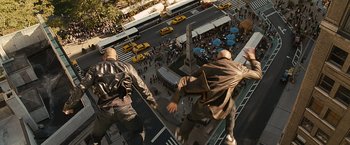Movie still from “The Other Guys” (2010), directed by Adam McKay – Two men are jumping off a platform in the middle of a city; Wide shot, Overhead angle