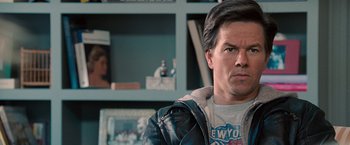 Movie still from “The Other Guys” (2010), directed by Adam McKay – A person wearing a leather jacket; Close Up shot, Over the shoulder angle