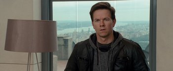 Movie still from “The Other Guys” (2010), directed by Adam McKay – A person wearing a leather jacket; Close Up shot, Over the shoulder angle