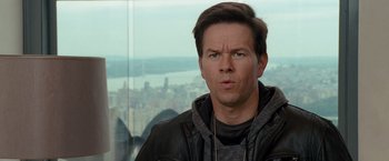 Movie still from “The Other Guys” (2010), directed by Adam McKay – A person wearing a leather jacket; Close Up shot, Over the shoulder angle