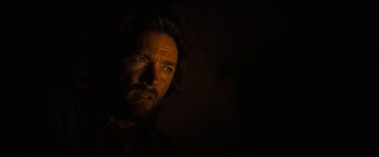 Movie still from “The Outlaw Josey Wales” (1976), directed by Clint Eastwood – A person with long hair looking at the camera; Close Up shot, Over the shoulder angle