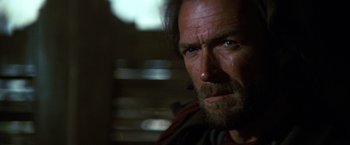Movie still from “The Outlaw Josey Wales” (1976), directed by Clint Eastwood – A person with a beard; Close Up shot, Low angle