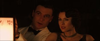 Movie still from “The Painted Veil” (2006), directed by John Curran – A man and a woman posing for a picture; Close Up shot, Low angle