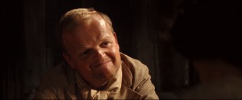 Movie still from “The Painted Veil” (2006), directed by John Curran – A person wearing a jacket; Close Up shot, Low angle