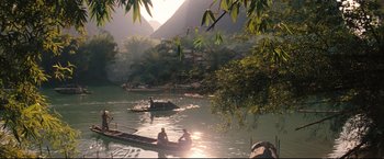 Movie still from “The Painted Veil” (2006), directed by John Curran – A couple of people on a boat in the water; Extreme Wide shot, High angle