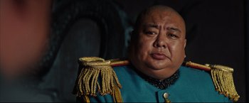 Movie still from “The Painted Veil” (2006), directed by John Curran – A man in a blue uniform with a gold rope around his neck; Close Up shot, Low angle