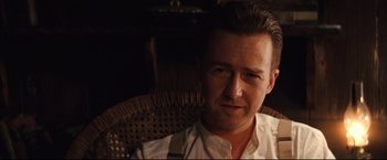 Movie still from “The Painted Veil” (2006), directed by John Curran – A person sitting in a chair; Close Up shot, Over the shoulder angle