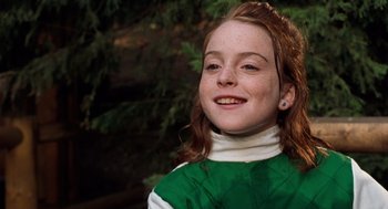 Movie still from “The Parent Trap” (1998), directed by Nancy Meyers – A young girl in a green and white shirt; Close Up shot, Low angle