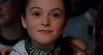 Movie still from “The Parent Trap” (1998), directed by Nancy Meyers – A young girl's face with green eyes; Close Up shot, High angle