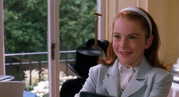 Movie still from “The Parent Trap” (1998), directed by Nancy Meyers – A young girl in a white jacket and a white shirt; Close Up shot, High angle