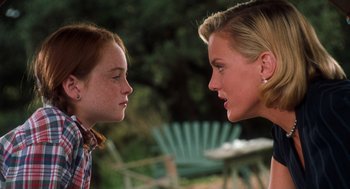 Movie still from “The Parent Trap” (1998), directed by Nancy Meyers – A woman talking to a young girl in a plaid shirt; Close Up shot, Over the shoulder angle